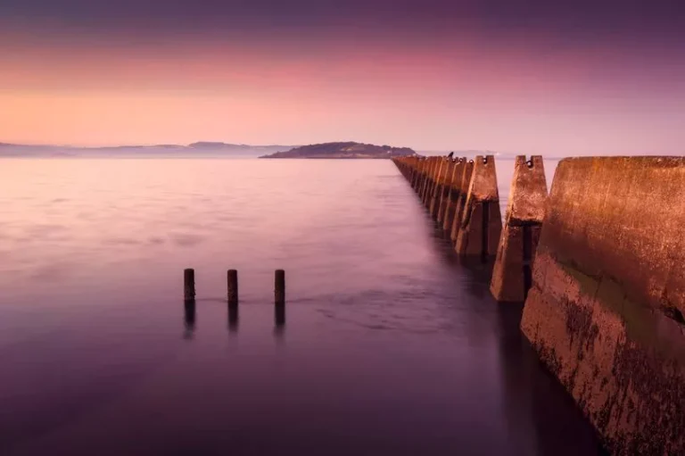 The Abandoned ‘Ghost Island’ Just Outside Edinburgh With Protective ‘Teeth’ You Can Only Reach On A Low Tide