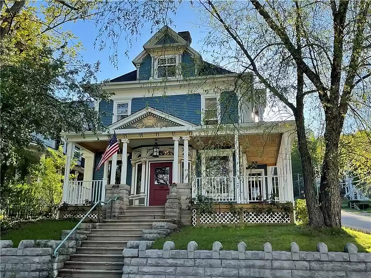 Colonial Revival With 6 Bedrooms And Original Handcrafted Woodwork For $349K!