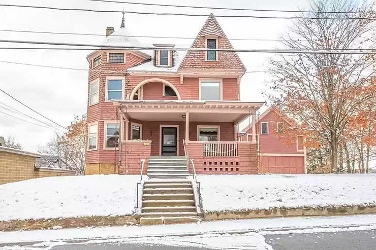 MA Shingle Style Victorian With Stunning Stained Glass For Only $265,000!