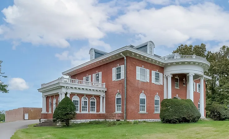 1938 Classical Revival Mansion With Circular Stairway On 197 Acres. Yours For Only $4,495,000!