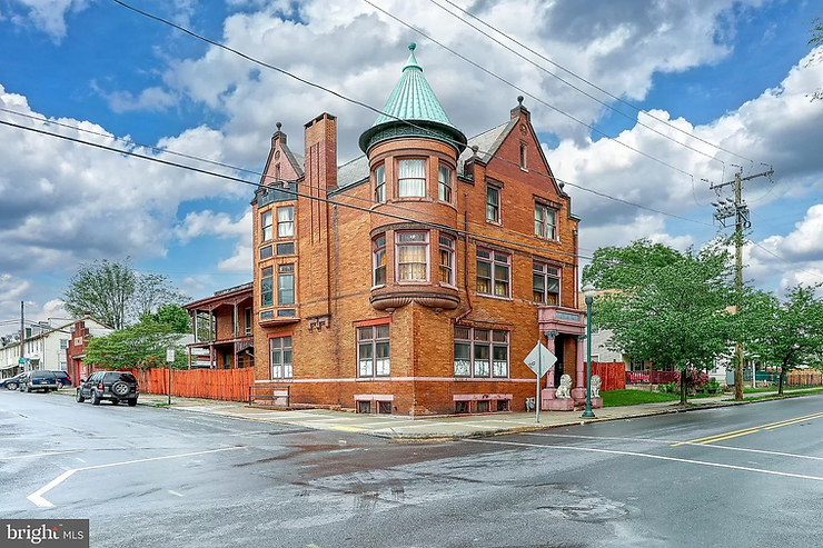 PA Mansion With Ornate Woodwork & Original Stained Glass For Only $225K!