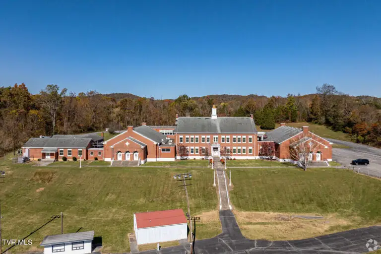 Iconic 1940 School Building With 16 Acres Of Usable Land Listing For $750,000!