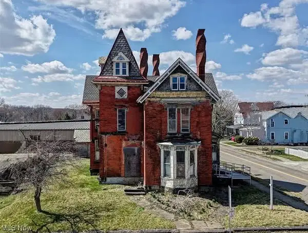 Wow! Those spiral chimneys! That woodwork! Circa 1877 in Ohio. $118,770