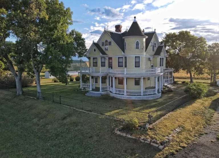 Such a pretty exterior! C. 1917. On 42 acres in Kansas. $350,000