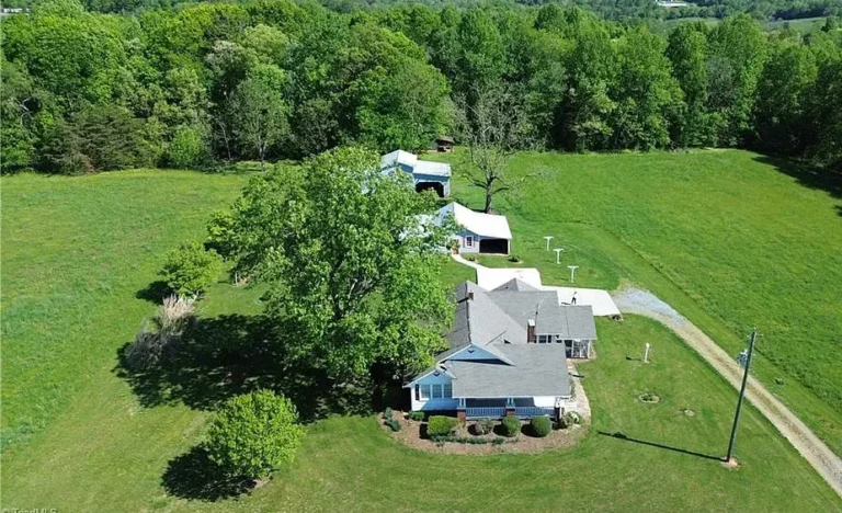 Close to vineyards and the Blue Ridge Parkway! On 13 acres in North Carolina. $329,000