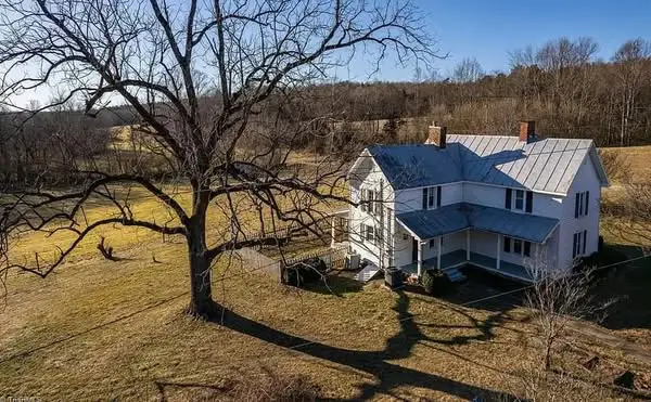 Real pretty setting! Circa 1892. On 13 acres in North Carolina. $299,900