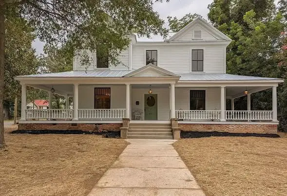 Look at the vintage kitchen! Great porch! Circa 1910 in North Carolina. $349,000