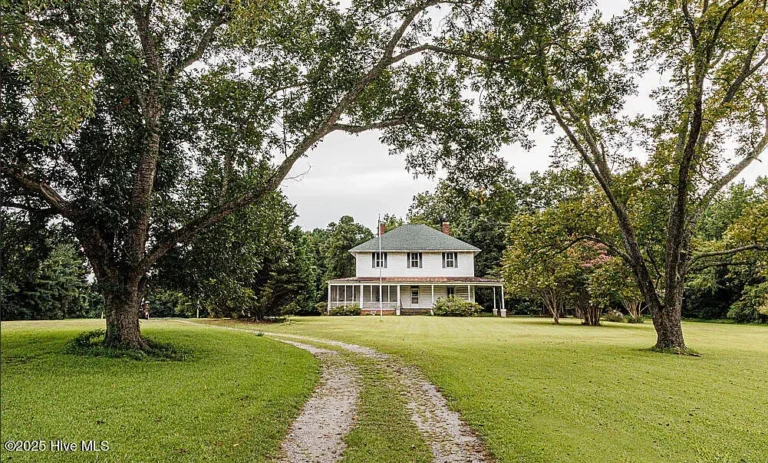 Love the long driveway! Fixer Upper Alert! On 2 1/2 acres in North Carolina. $184,900
