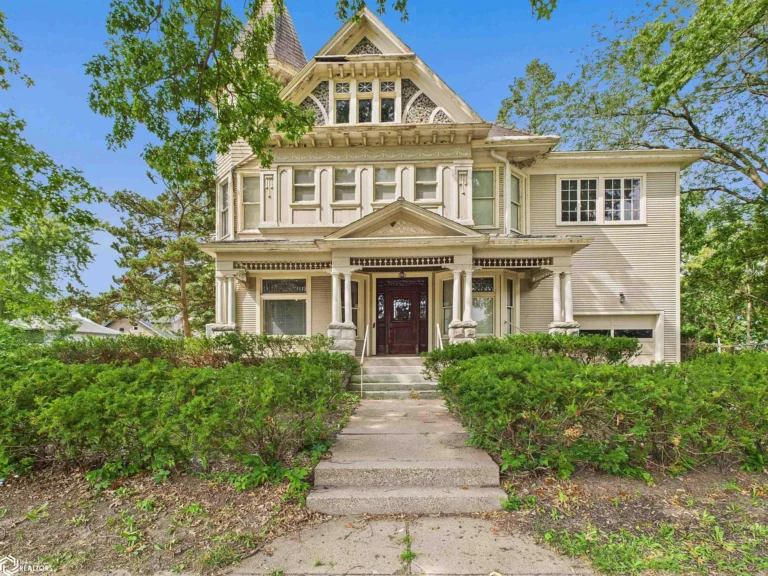 Beautiful woodwork and stained glass! Five bedrooms in Iowa. $169,900.