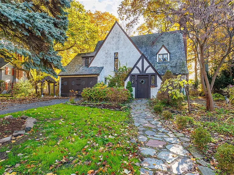 $300,000! Charming 1929 Colonial on 0.5 Acres Backing to Allen Creek – 4 Beds, 2 Baths, Pittsford Schools!