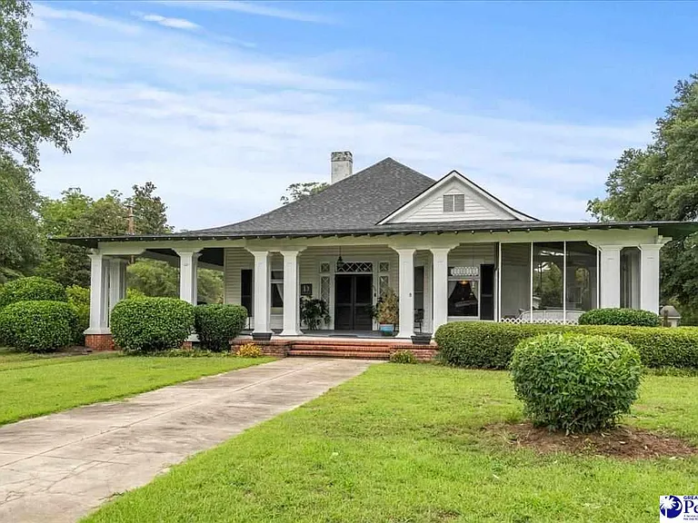 That screened porch is perfect! On 2 1/2 acres in South Carolina. $279,900.