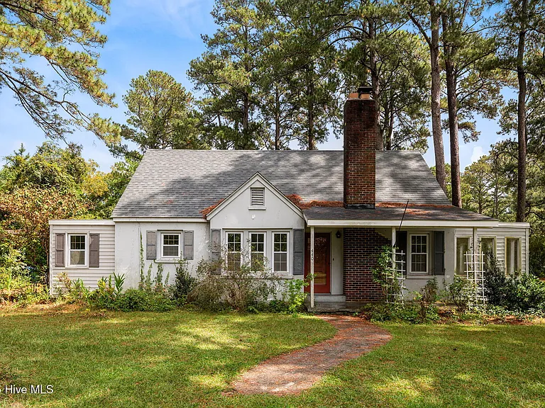 Nice Sunroom! Pretty Yard! C. 1945 in North Carolina. $72,000