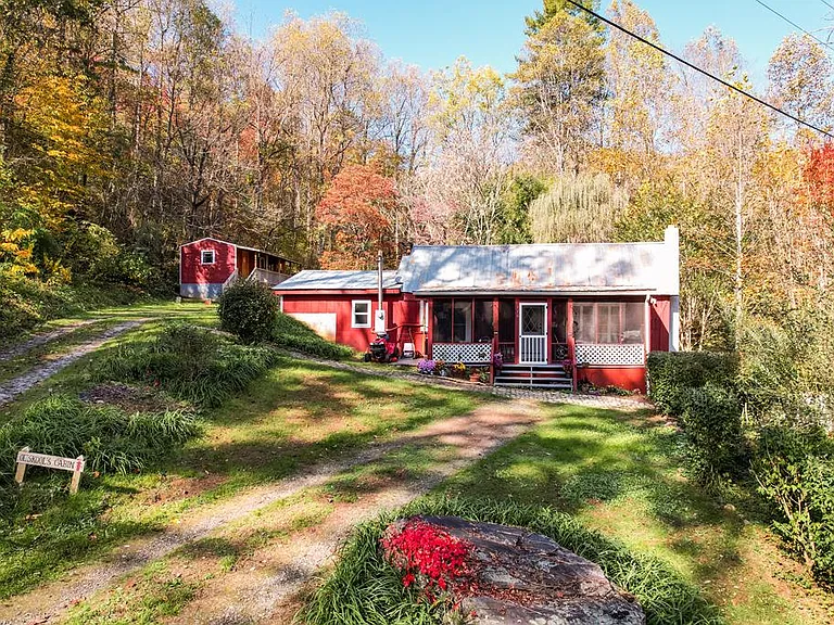 Has a guest house! Cute cottage in the woods! Over two acres in NC. $199,900