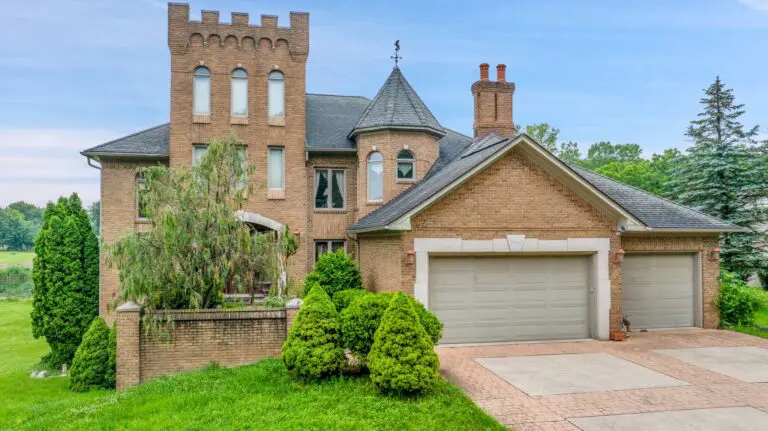Check Out This Castle! Circa 1995 Home With Detailed Stonework In Grosse Ile, Michigan For $699,999!