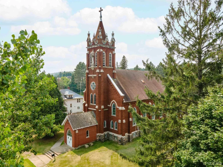 Check out the stained glass!! Historic 1910 church in Michigan. $395,000.