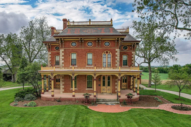 Check out the staircase!! Historic 1860s Brick Mansion in Iowa. $789,000.