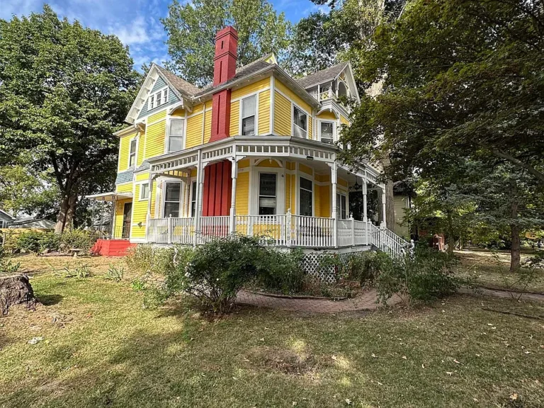 Check out the fireplace! Historic 1880s gem in Peoria. $135,000.
