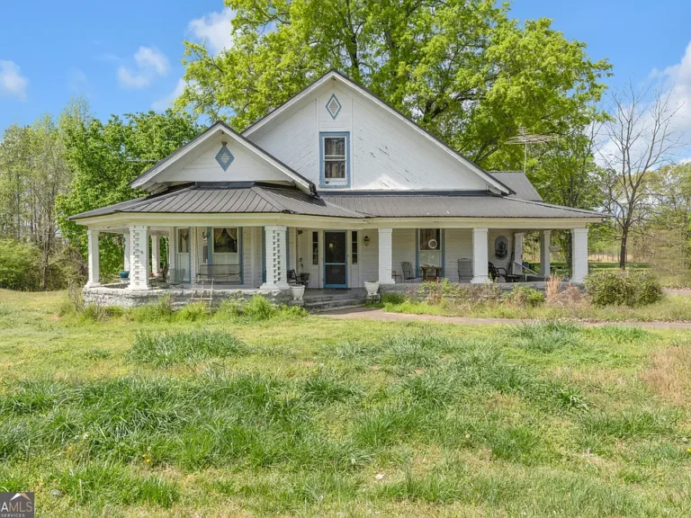Beautiful land and vintage details! C. 1920 in Georgia. $219,000.