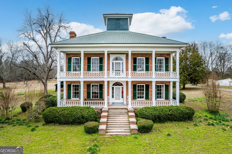 Check out the porches!! 4,300 sq. ft. historic brick home in Sparta. $219,900.
