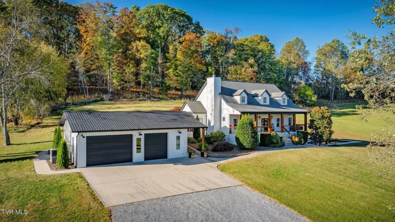 Mountain views and a private pool! 20+ rolling acres in Tennessee. $1,550,000.