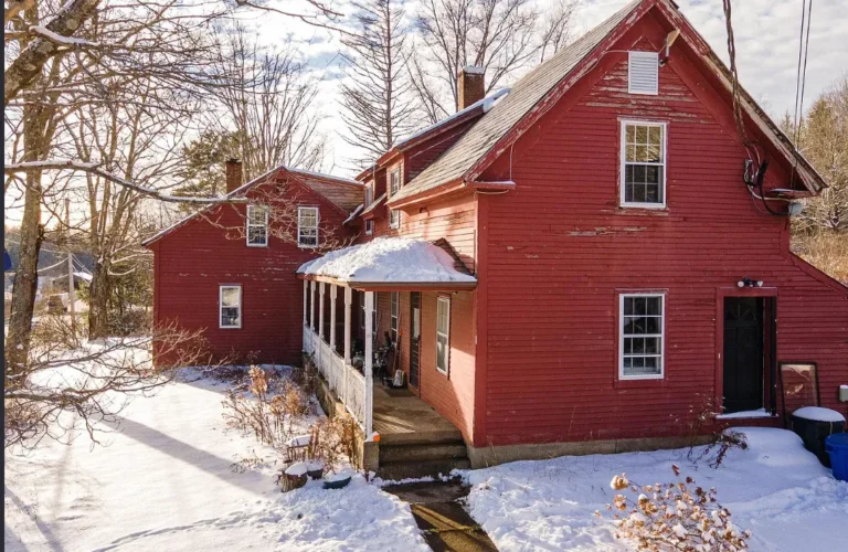 Stunning mountain setting! Classic farmhouse with five acres in New Hampshire. $450,000.