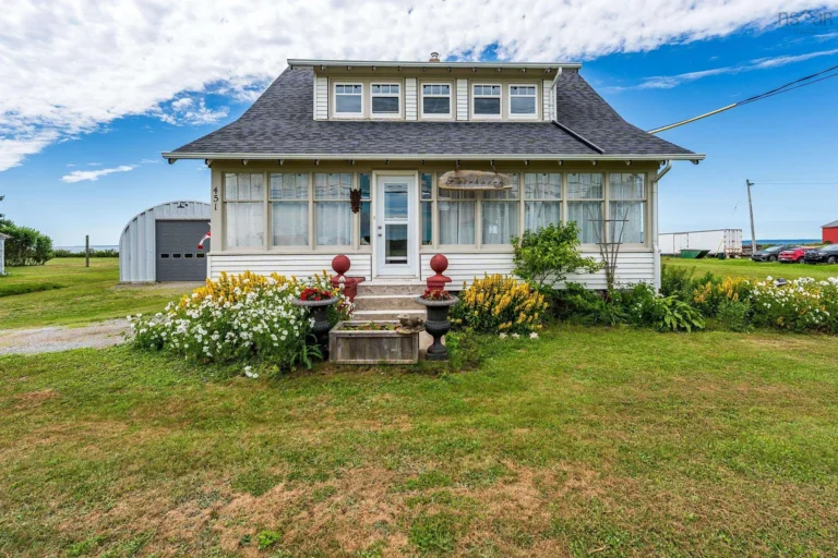 Stunning ocean views! Classic 1943 home on 1.5 acres in Nova Scotia. $399,900.