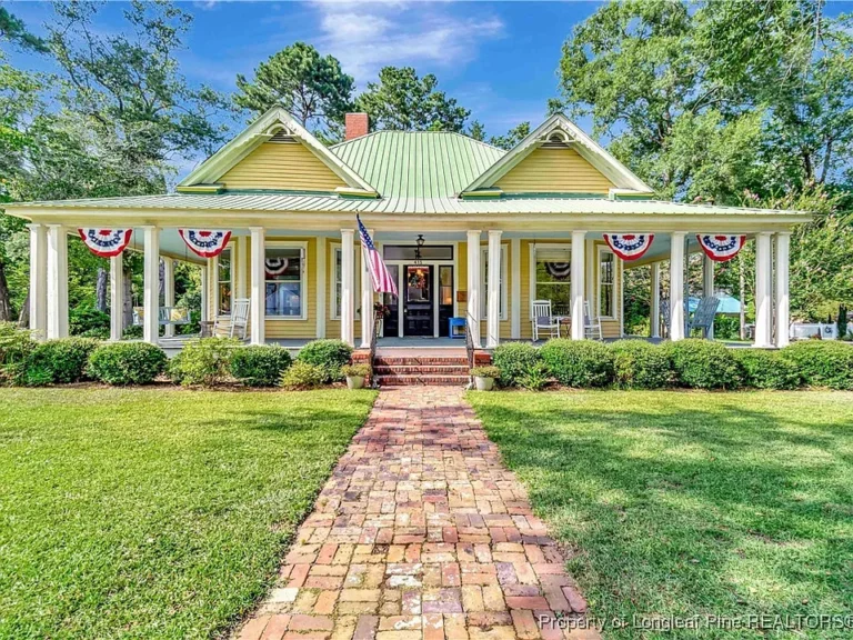 Beautiful woodwork! Great wraparound porch! C. 1910 in Red Springs. $259,000.