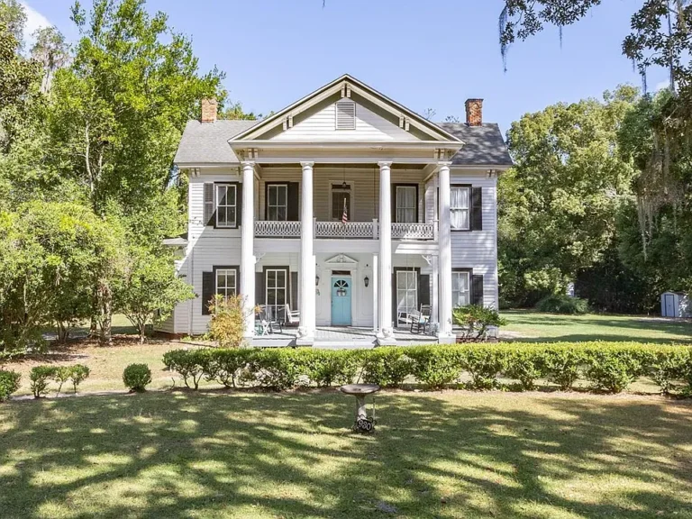 Pretty front porch! Historic Classic Revival in Monticello. $449,000.