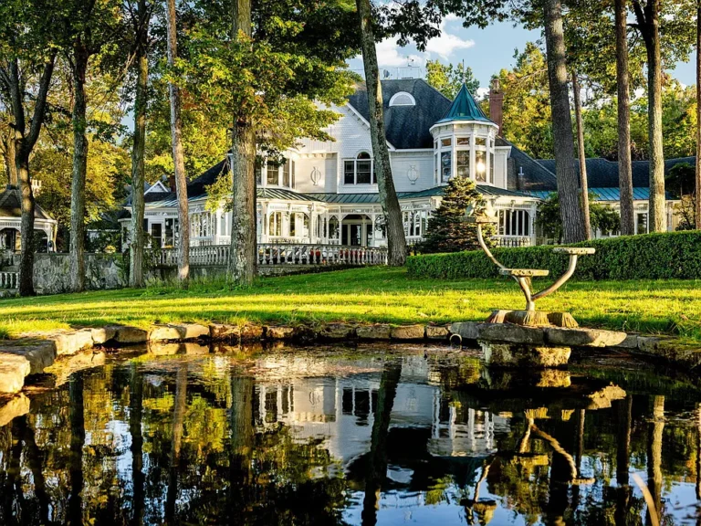 Check out the Great Room! 1,500+ feet of lakefront in Michigan. $8,999,000.