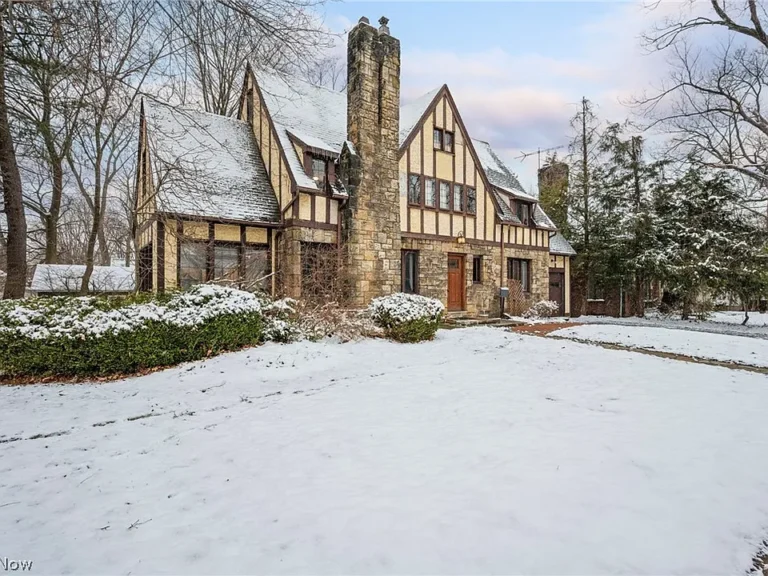 Pretty sunroom and wood details! C. 1930 in Lake County. $164,900.