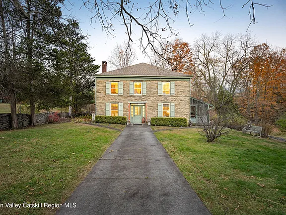 Stunning stone work and 20 acres! C. 1820 in New York. $639,000.