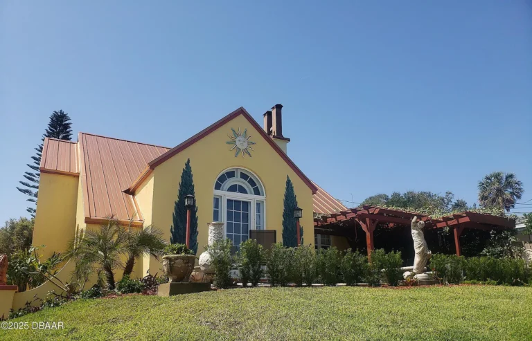 Pretty wood details and stone fireplace! Rare 1925 custom build in FL. $595,000.