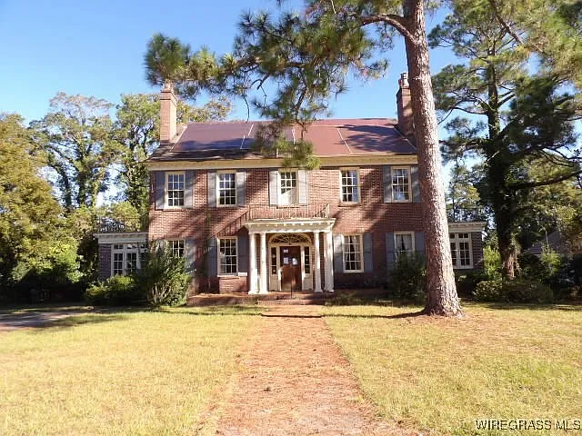 Great potential! Historical 3,500+ sq ft home with a pool. $199,900.