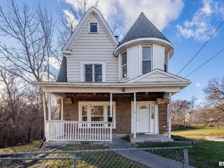 Check out the porch! Historic details in Iowa. $99,999.