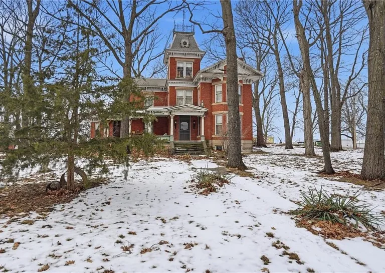 Beautiful woodwork! Original water tower! C. 1860 in Missouri. $295,000.