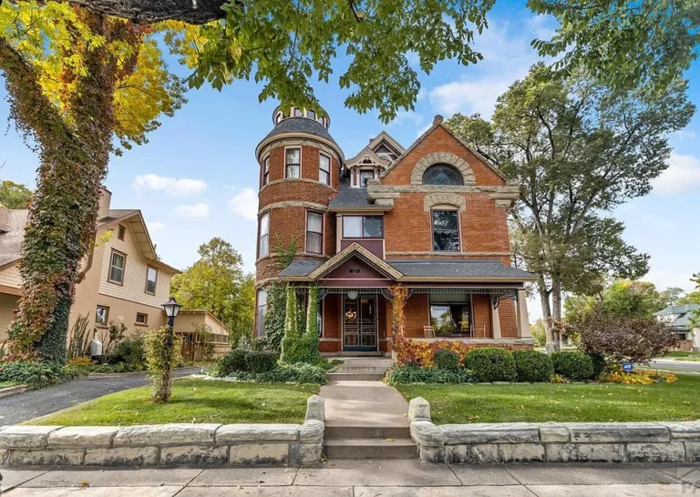 Stunning woodwork and pocket doors! C. 1900 in Colorado. $699,500.