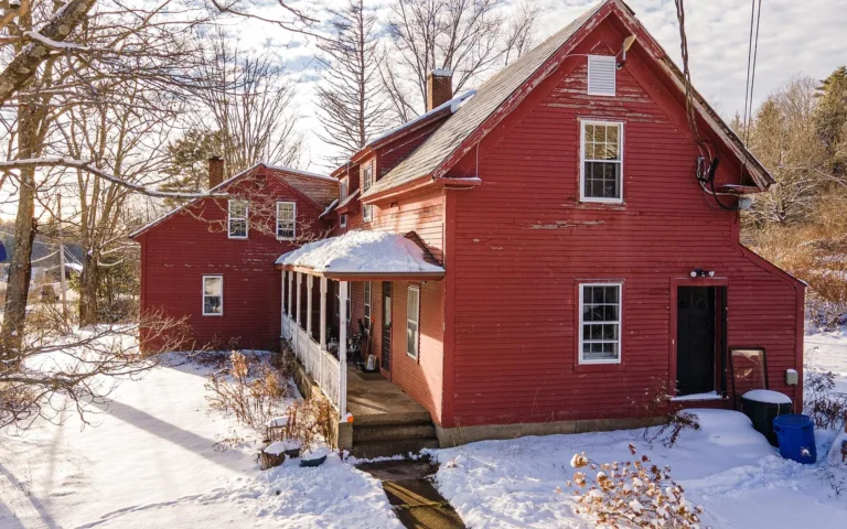 Pretty garden setting! Classic farmhouse with views in NH. $450,000.