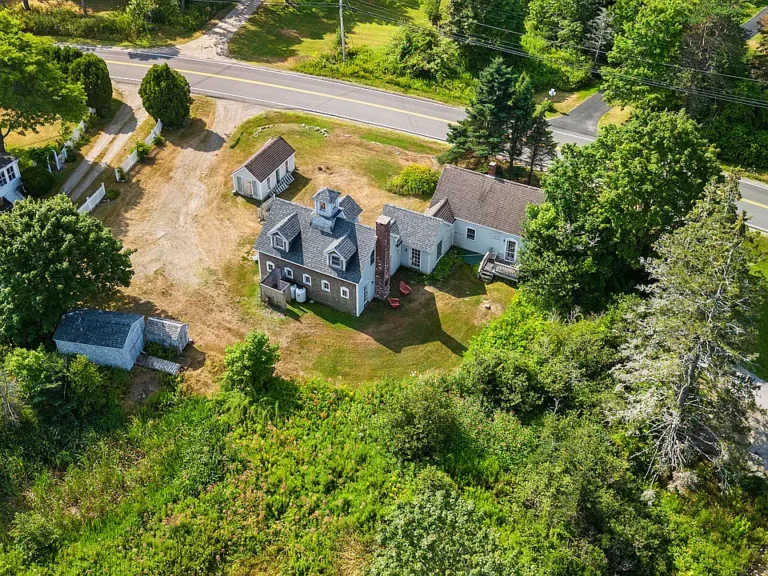 Check out the acreage!! 4-bedroom farmhouse in Maine. $419,000.