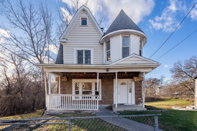 Check out the porch!! Historic C. 1900 in Davenport. $107,000.