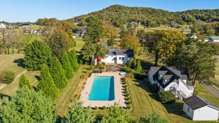 Love the long driveway! Four houses on 31 acres! C. 1900 in Tennessee.