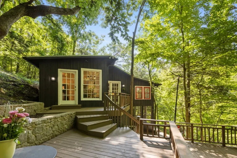 Pretty lake views and setting! C. 1930 on 105 acres in Tennessee. $749,000.