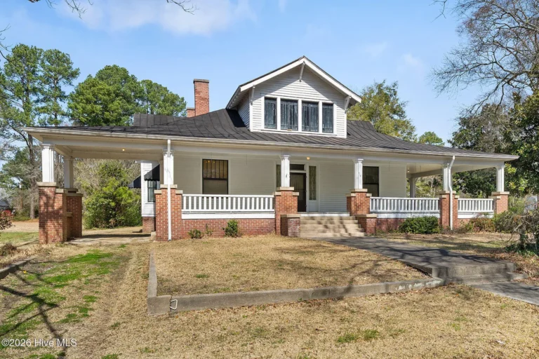 Porch goals! Huge potential! Over 2,700 sqft. C. 1928 in North Carolina. $199,000.