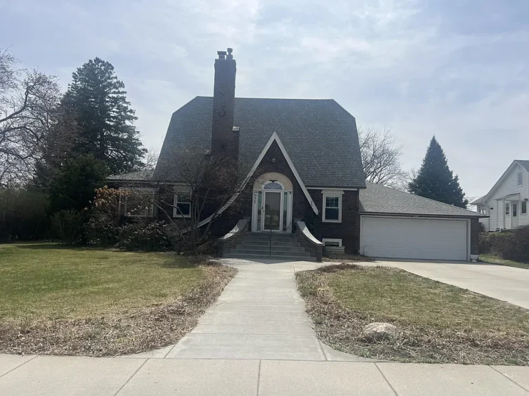 Beautiful woodwork and sunroom! Massive 3,700+ sq ft home. $355,000.