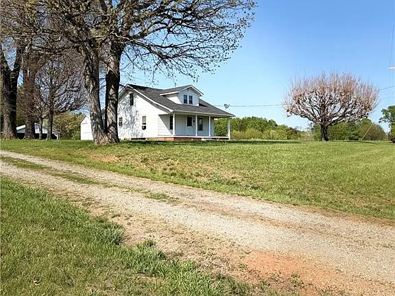 Country views and classic charm! Over 16 acres in North Carolina. $349,900.
