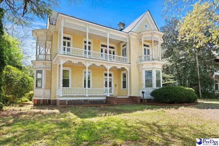 $149,900! Huge potential! Beautiful porch! C. 1890 Queen Anne Victorian in South Carolina.