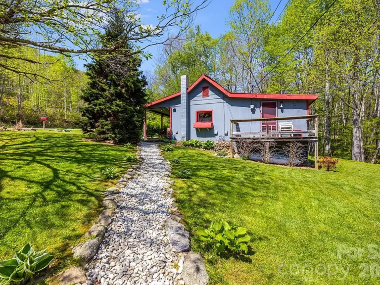 Two cabins and a creek! Half an acre in North Carolina. $198,000.