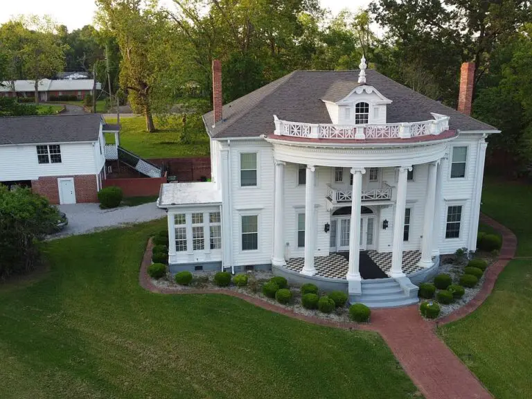 Stunning double staircase! Has a guest cabin! Over 5,000 sqft! C. 1898 on two acres in Alabama. $398,000.