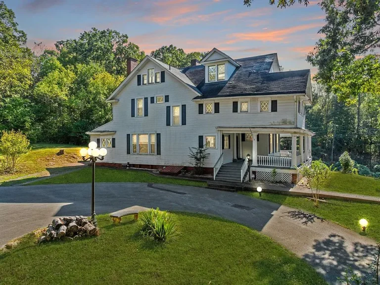 Beautiful woodwork! C. 1905 on seven acres in Kentucky. $120,000.