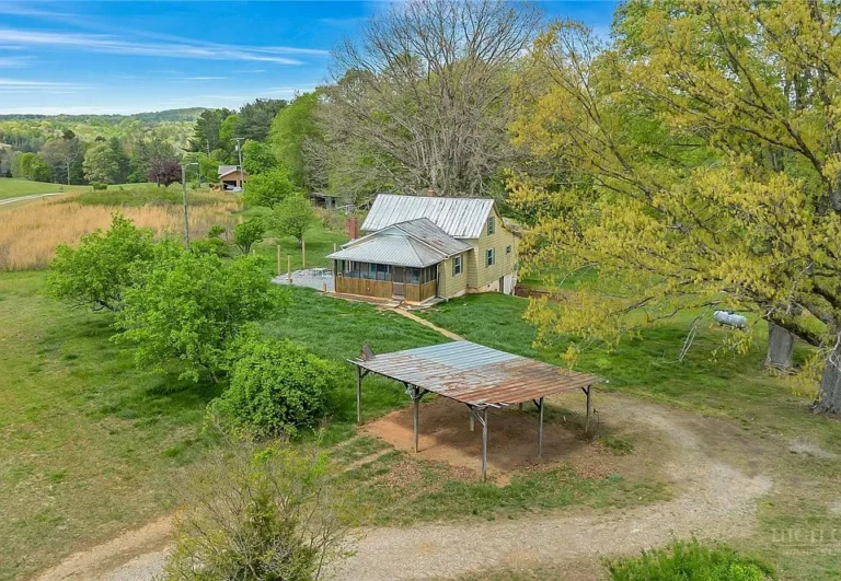 Mountain views and high ceilings! 8.6 beautiful acres in NC. $180,000.