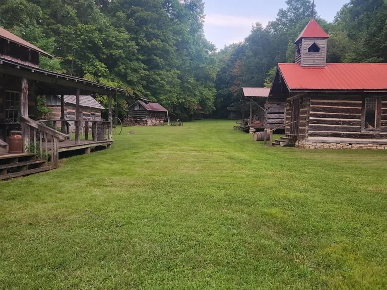 Check out the stained glass!! Historic 10-cabin village on 25 acres in Kentucky. $350,000.